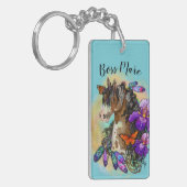 アイリスおよび蝶を持つペンキの馬のムスタング キーホルダー (正面左)