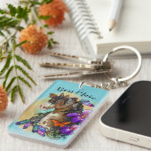 アイリスおよび蝶を持つペンキの馬のムスタング キーホルダー (正面右)