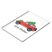 アイリッシュセッター木を上にして車を運転する。 ノートブック (左側)