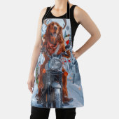 アイルランドの赤いセッタードウッグにオートバイのクリスマスに乗る エプロン (インサイチュ)