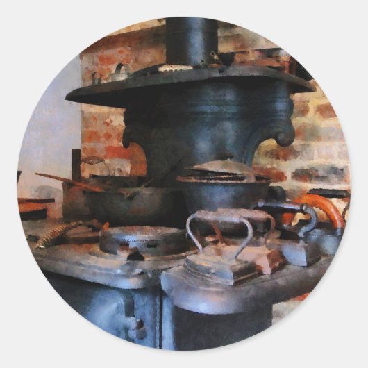 アイロンがストーブで加熱 ラウンドシール (正面)
