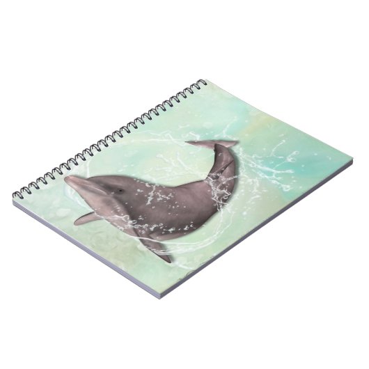 アクアグリーンのまわりにウォーターにイルカがはね込む ノートブック (左側)