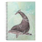 アクアグリーンのまわりにウォーターにイルカがはね込む ノートブック (正面)
