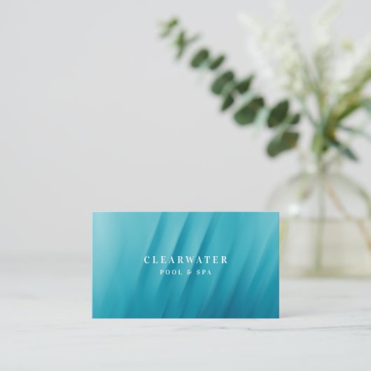 アクアティール（緑がかった色）ブルーウォーターリップルプール&スパ 名刺 (スタンド正面)