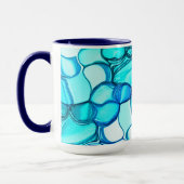 アクアマリンに似たトーンの石のように丸い マグカップ (左)