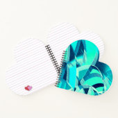 アクアマリンの背景にドリジルが付いたシアンのトラック ノートブック (内部)