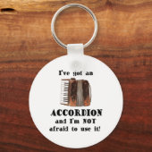 アコーディオン得を持っている キーホルダー (正面)
