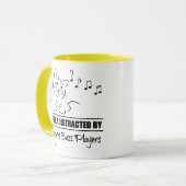 アップライトベースのプレイヤーに気を取られやすい猫 マグカップ (正面左)