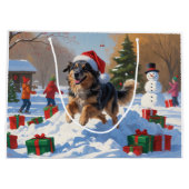 アナトリアン・シェパードのクリスマス　雪のお祭り ラージペーパーバッグ (裏面)