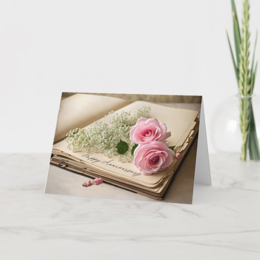 アニバーサリーピンクのバラが古いスクラップブックに カード (正面)