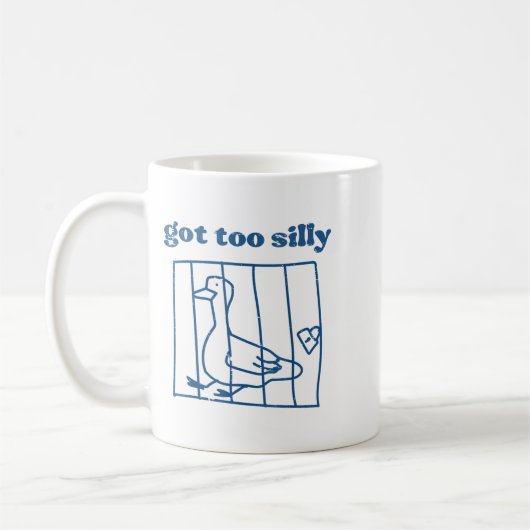 アヒルが馬鹿すぎる動物の絵 コーヒーマグカップ (左)