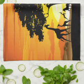 アフリカのサバンナに生息する野生動物の夕日 キッチンタオル (折り畳み)