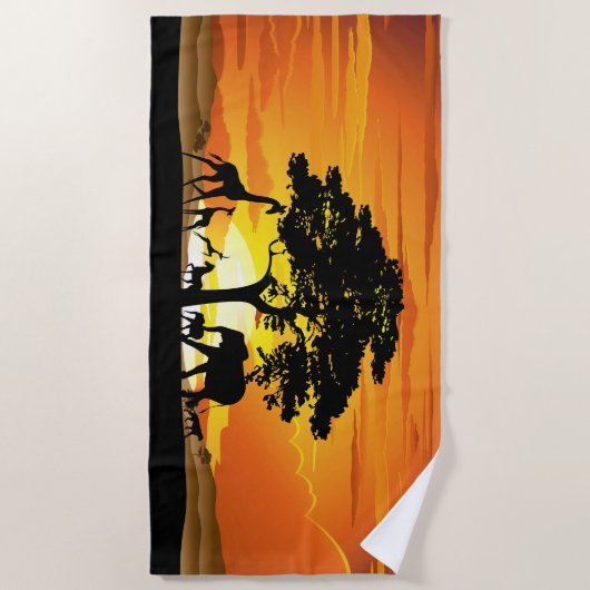 アフリカのサバンナに生息する野生動物の夕日 ビーチタオル (正面)