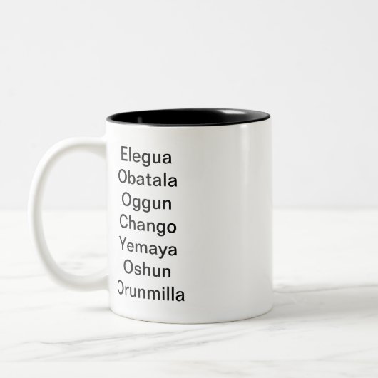 アフリカの七つの力を持つマグ ツートーンマグカップ (左)