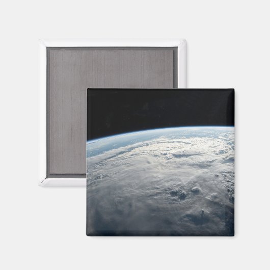 アフリカの海岸上空の熱帯低気圧台。 マグネット (正面/裏面)