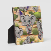 アフリカンサバンナで象のベビーが幸せにジャンプ フォトプラーク (正面)