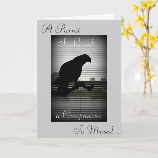 アフリカ灰色のオウムのシルエットの悔やみや弔慰 カード (黄色い花)