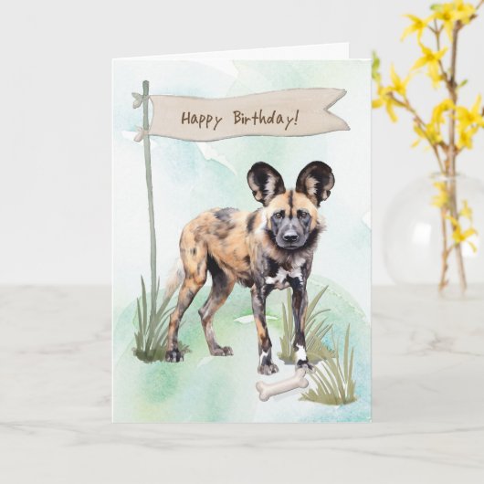 アフリカ産の野生の犬が誕生日の標識の下で繁殖 カード (黄色い花)