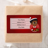 アフロの漫画を持つクリスマスガール ラベル (インサイチュ)