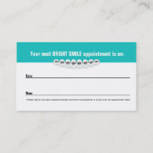 アポイントメントカードが付いている歯科矯正医の名刺 予約カード (裏面)