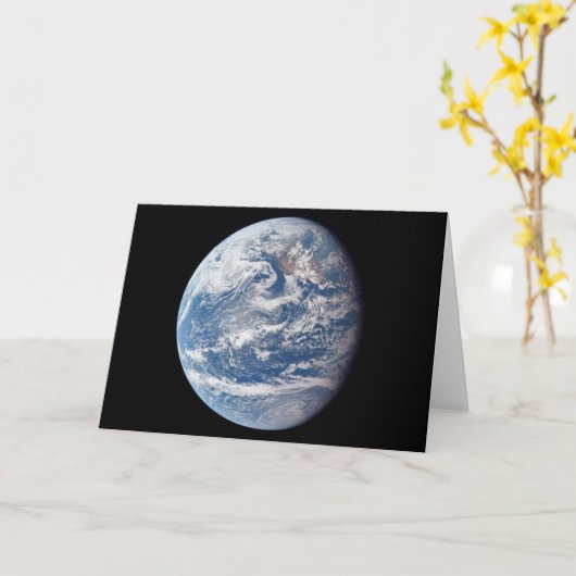 アポロ11号の乗組員によって撮影された惑星の地球。 カード (黄色い花)
