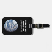 アポロ11号の乗組員によって撮影された惑星の地球。 ラゲッジタグ (正面横)
