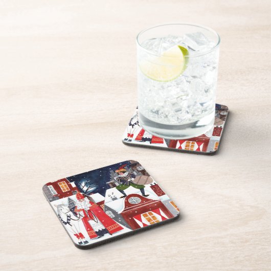 アムステルダムの屋根の上のシンタークラースとピート コースター (右側)