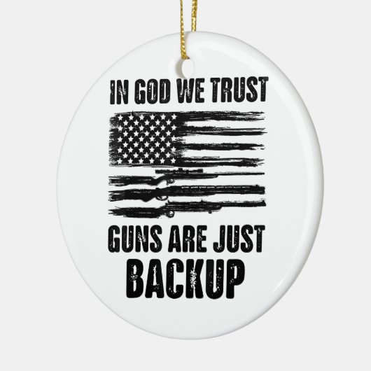アメリカが銃を持ち直したばかりだと信じている セラミックオーナメント (左)