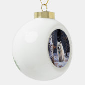 アメリカのエスキモーが雪のクリスマスを過ごす セラミックボールオーナメント (左)