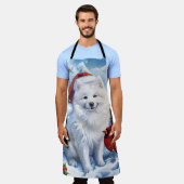 アメリカのエスキモー犬の冬のワンダーランドクリスマス エプロン (着用した状態)