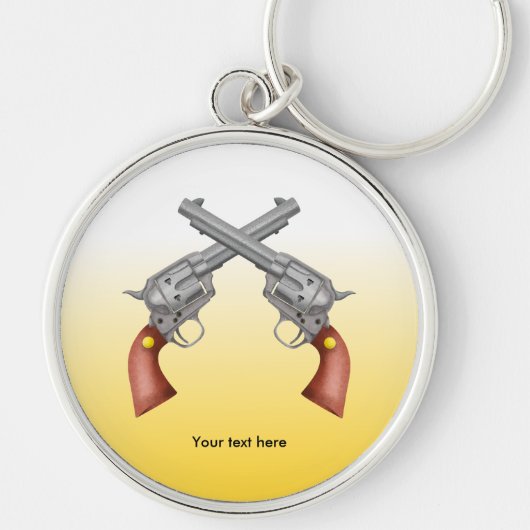 アメリカの古い西ピストル2丁が交差した キーホルダー (正面)