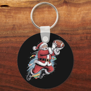 アメリカンフットボールをプレーするサンタクロース クリスマス キーホルダー