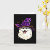 アメリカン・エスキモー・ドッグの魔女の帽子 楽しいハロウィンの犬 カード (黄色い花)