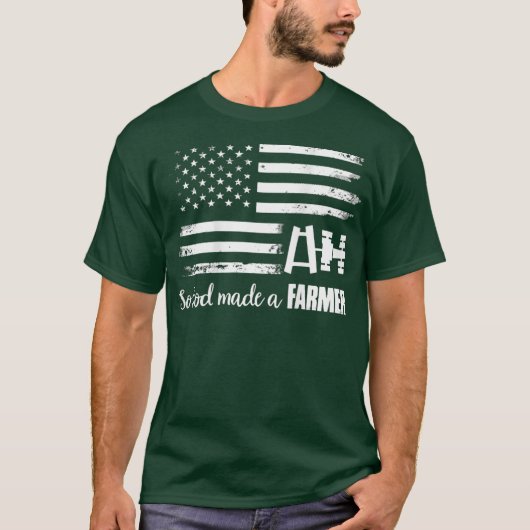 アメリカ国旗のトラクターだから神は農家 Tシャツ (正面)