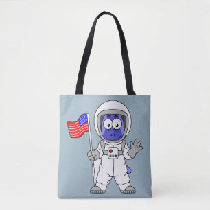 アメリカ国旗を掲げている宇宙飛行士。 トートバッグ
