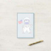 アメリカ国旗を掲げている宇宙飛行士。 ポストイット (デスク上)