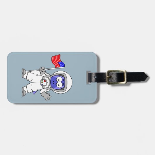 アメリカ国旗を掲げている宇宙飛行士。 ラゲッジタグ (正面横)