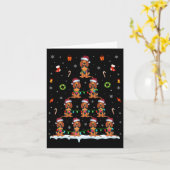 アメリカ英語の犬のクリスマスツリーの光を探す カード (黄色い花)