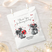 アライグマのカップル フェイバーバッグ (クリップ留めされた状態)