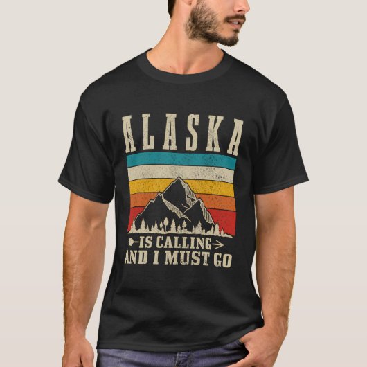 アラスカは私が行かねばならないヴィンテージ山脈ひき Tシャツ (正面)
