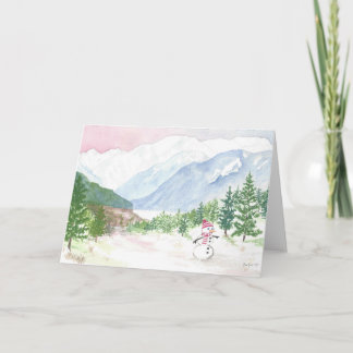 アラスカ山の雪だるまのクリスマスカード シーズンカード