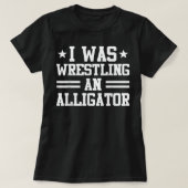 アリゲーターストーリおもしろいー脚アンプティー義足サージ Tシャツ (デザイン正面)