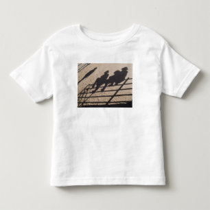 アリゾナ州ツーソン:ロデオ競技者の影 トドラーTシャツ
