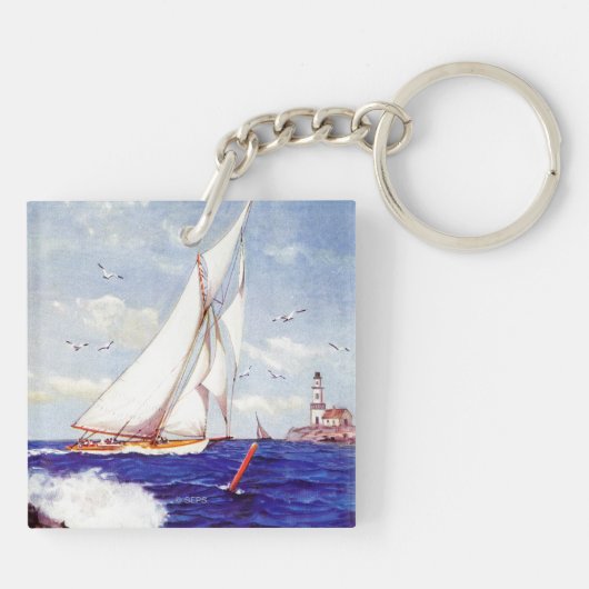 アルバートBの灯台のそばを航行している。マーク キーホルダー (裏面)