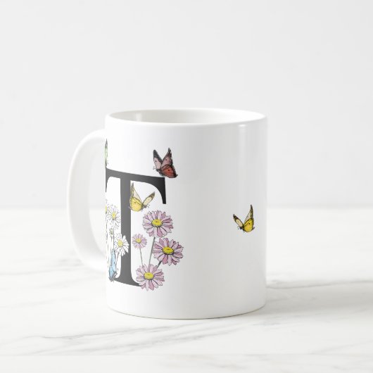 アルファベットTの花と蝶のモノグラムイニシャル コーヒーマグカップ (正面左)