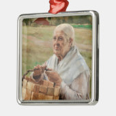 アルベルト・エーデルフェルト - 古い女の子が割れ目のある籠を持つ メタルオーナメント (左)