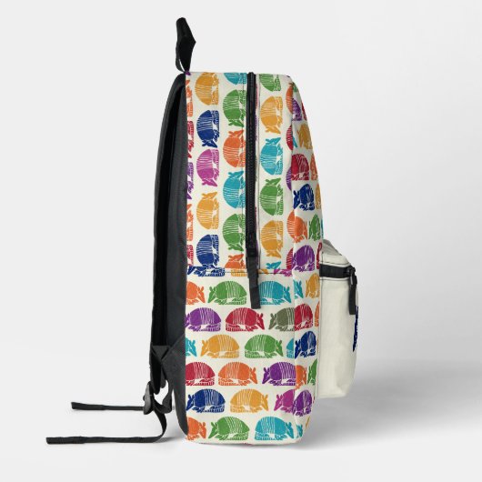 アルマジロカラフルスパターン（の模様が）あるクリームアイボリー プリントバックパック (左)