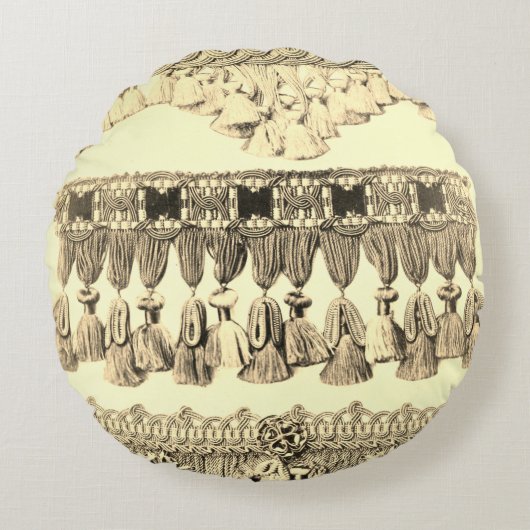 アンティークタッセルレースのトライバルパターンクリームブラック ラウンドクッション (正面)