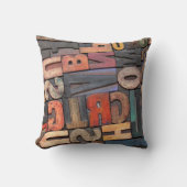 アンティーク版の印刷ブロックにカラーのインクパティを付ける クッション (正面)