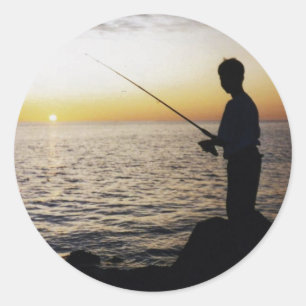 アンナ・マリアの夕暮れの若い男の魚釣り。 ラウンドシール
